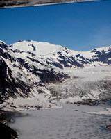 Glaciers, mountains, and snow in and around Taku Inlet taken from a De Haviland DHC-3 Otter of Wings Airways