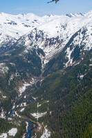 Glaciers, mountains, and snow in and around Taku Inlet taken from a De Haviland DHC-3 Otter of Wings Airways