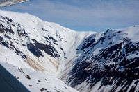Glaciers, mountains, and snow in and around Taku Inlet taken from a De Haviland DHC-3 Otter of Wings Airways