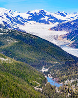 Glaciers, mountains, and snow in and around Taku Inlet taken from a De Haviland DHC-3 Otter of Wings Airways