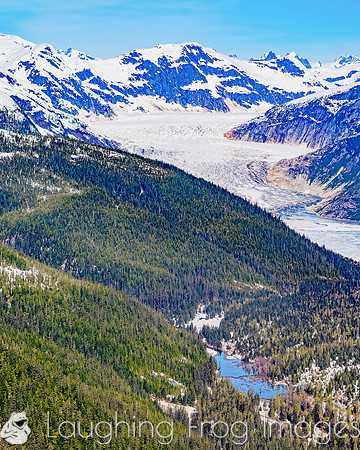 Glaciers, mountains, and snow in and around Taku Inlet taken from a De Haviland DHC-3 Otter of Wings Airways