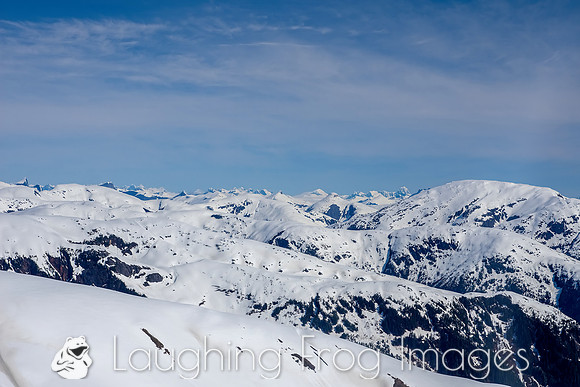 Glaciers, mountains, and snow in and around Taku Inlet taken from a De Haviland DHC-3 Otter of Wings Airways
