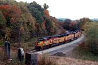 CSX 8632 trails a Helper Set at Graveyard Curve.