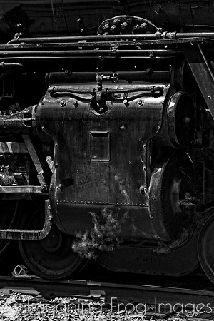 steam wisps from a cylinder