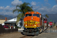 BNSF 105 shoving across Fifth Street, La Verne, CA