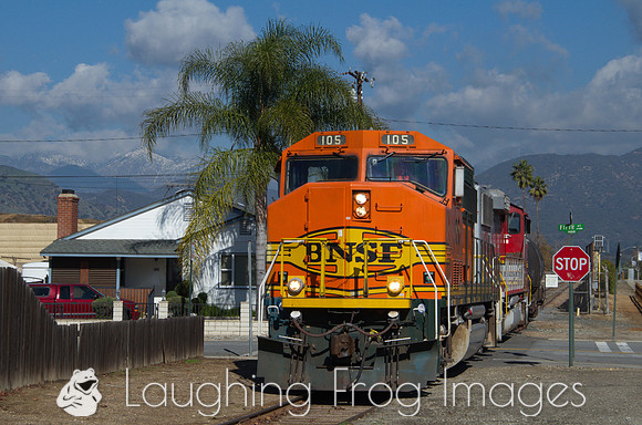 BNSF 105 shoving across Fifth Street, La Verne, CA