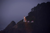 Heceta Head Lightouse and beam at dusk, color