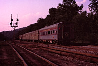 Private car PRR 1155 brings up the rear as the crew prepares to run around the train.