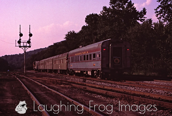 Private car PRR 1155 brings up the rear as the crew prepares to run around the train.