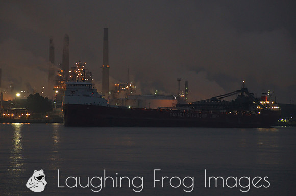 CSL Tadoussac upbound on the St. Clair River passing the Esso Refinery in Sarnia, ONT.