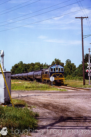 PH&D 60 at the stop sign for the MI-29 crossing in Marysville, 7/1982.