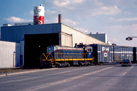 PH&D 60 crossing M-29 at Diamond Crystal Salt in St. Clair, 4/1984.