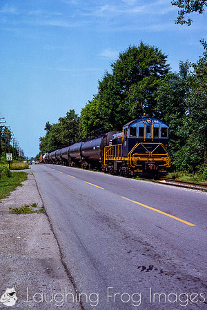 PH&D 60 southbound along 32nd St., 7/1982.