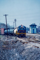 PH&D 60 pulls east with GT's Tappan Tower in the background, 4/1984.