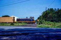 PH&D 60 passes Biewer Lumber as it shoves to Diamond Crystal in St. Clair, 7/1982.
