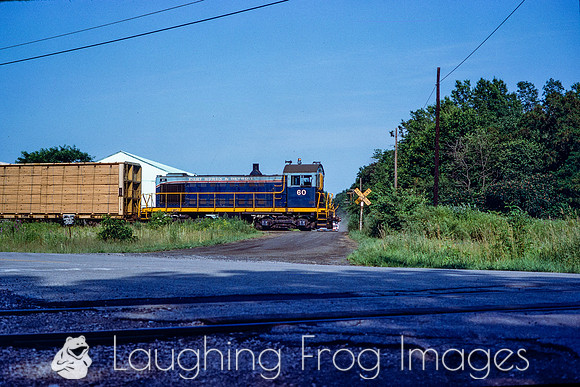 PH&D 60 passes Biewer Lumber as it shoves to Diamond Crystal in St. Clair, 7/1982.